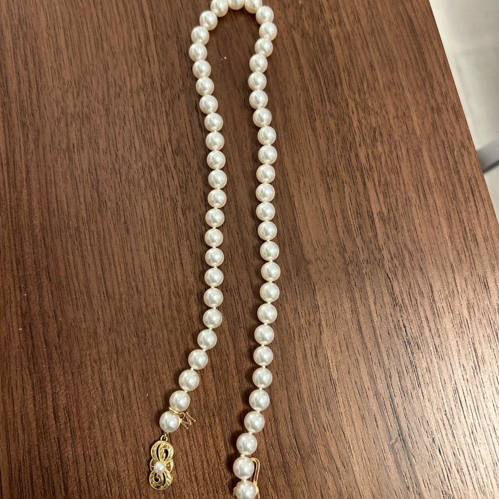 Mikimoto White Pearl Necklace with Gold Clasp and Classic Design